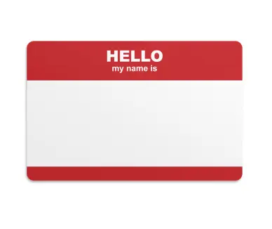 Red and white name badge with the word 'hello'