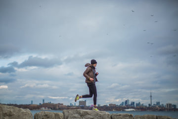 Person running on a cloudy day