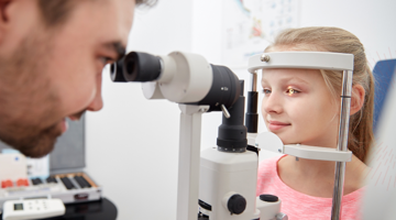 Child having eye examination 