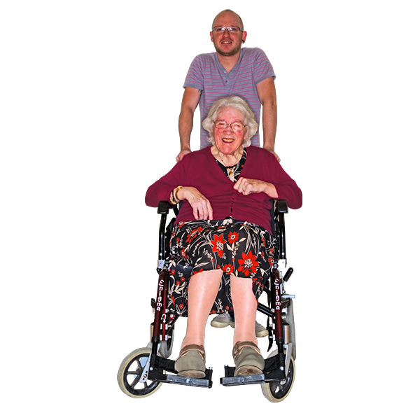 Person in a wheelchair with their carer easy read