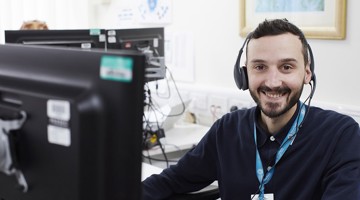 Office member of staff on the phone