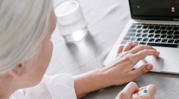 Woman at home with computer